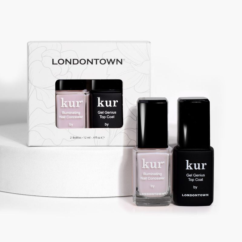 Two LONDONTOWN nail polish bottles are showcased. One is a pink Conceal + Go, perfect for natural nails, and the other is a Gel Genius Top Coat. Both are placed in front of their packaging, presenting an ideal duo for impeccable nail care.