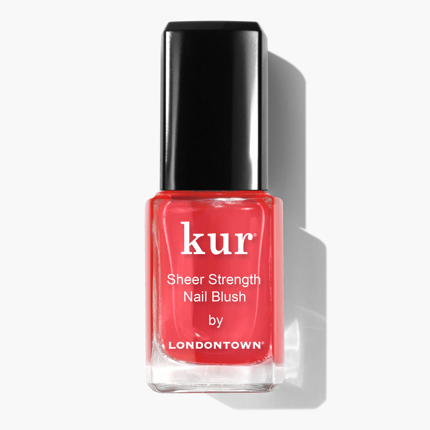 A bottle of LONDONTOWN Sheer Strength Nail Blush - Poppy, featuring a red nail polish with a black cap and enhanced with a nail hardener for extra durability, is displayed against a white background.