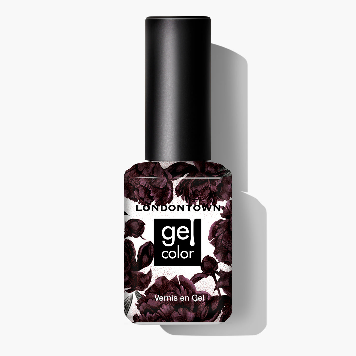 Bottle of LONDONTOWN nail polish in the shade "Spilled Wine," featuring a dark floral design on the label and a black cap. The text on the bottle reads, "Londontown gel color Vernis en Gel." This rich hue, reminiscent of pinot noir, is perfect for adding a touch of elegance under candlelight.