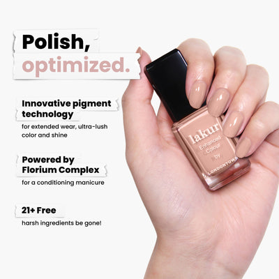 A hand holds LONDONTOWN's Peach Pop Lakur nail polish, highlighting its advanced pigment technology and Florium Complex for lasting wear and nail conditioning. This vegan, cruelty-free formula eliminates 21+ harsh ingredients for a milder manicure experience.