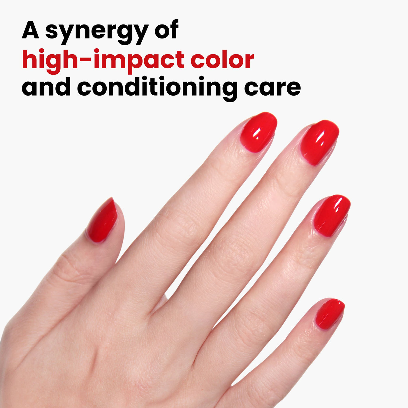 A hand with glossy red nails in LONDONTOWN's Londoner Love polish appears against a white background, showcasing "A synergy of high-impact color and conditioning care." This cruelty-free, vegan formula keeps your nails stunning while aligning with your ethical values.