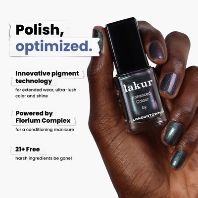 Holding a bottle of LONDONTOWN's Skyline Reflect nail polish, featuring innovative pigment technology with Florium Complex. This multichromatic crème is vegan, cruelty-free, 21+ free of harsh ingredients like formaldehyde for a conscious manicure.