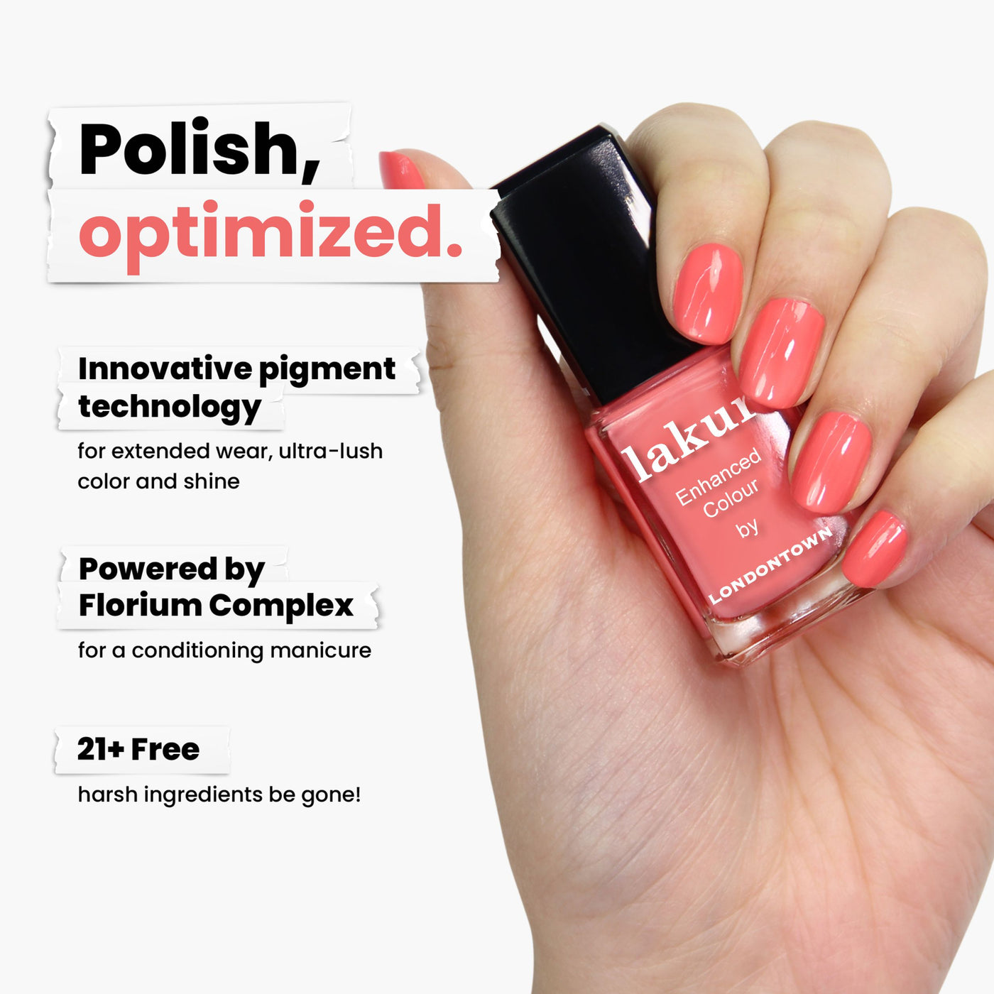 A hand holds a bottle of LONDONTOWN's "Papaya" pink nail polish, labeled "lakur Enhanced Colour." It features innovative pigment technology and is free from 21+ harsh ingredients. This vegan, cruelty-free polish offers rapid drying for a perfect creamy coral finish.