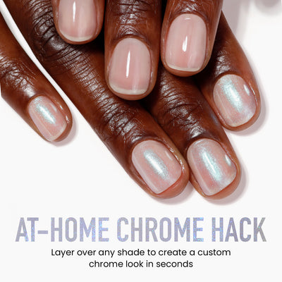 Close-up of hands with iridescent polish. Text reads, "AT-HOME CHROME HACK: Use LONDONTOWN's Moonstone Chrome to achieve a crème-to-chrome glaze by layering over any shade for a custom look in seconds.