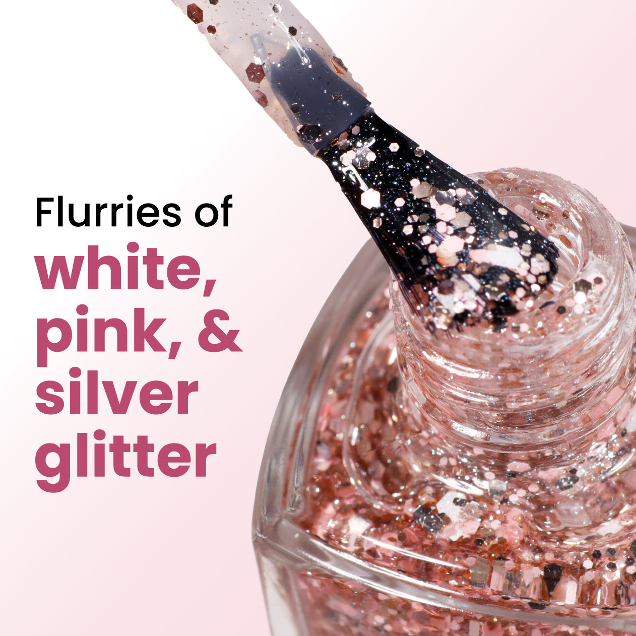 The Snowglobe Confetti Topper by LONDONTOWN features a nail polish brush with sparkle-infused white, pink, and silver glitter in clear liquid, partially withdrawn from the bottle, alongside text on the left.