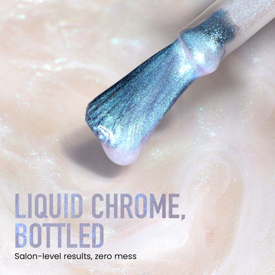 Close-up of a brush with Moonstone Chrome by LONDONTOWN, featuring blue iridescent nail polish over a pearlescent background. Text: "Liquid Chrome, Bottled. Enjoy salon-level results and the perfect lakur finish, minus the mess.