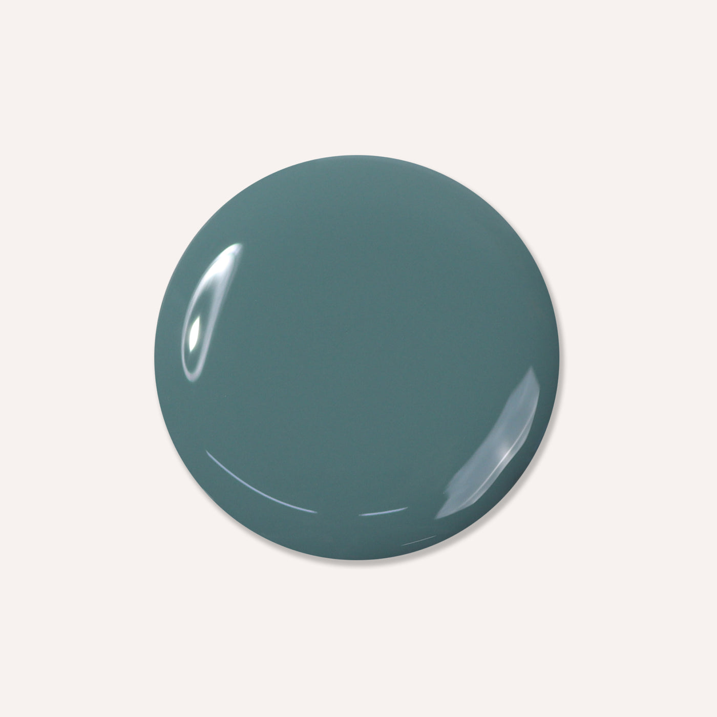 A sumptuous round splotch of Velvet Drapes by LONDONTOWN, in a teal hue with a hint of olive green, graces a plain white background.