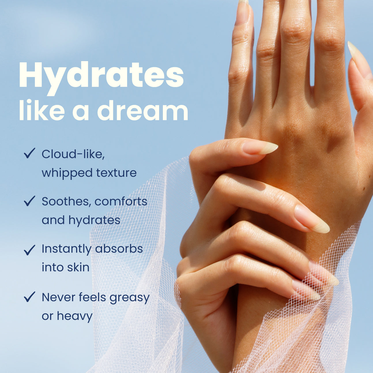 Manicured hands with long nails are pictured against a blue sky background, showcasing the benefits of LONDONTOWN's Whipped Cloud Hand Cream, including its whipped texture and non-greasy feel.