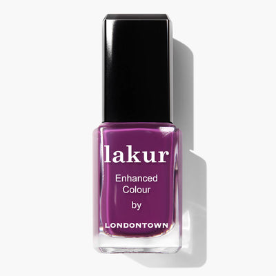 A bottle of Portobello Plum (Professional) by LONDONTOWN, featuring a deep warm plum crème shade reminiscent of Portobello Market, complete with a black cap. This vegan cruelty-free nail polish combines luxurious color with ethical beauty.