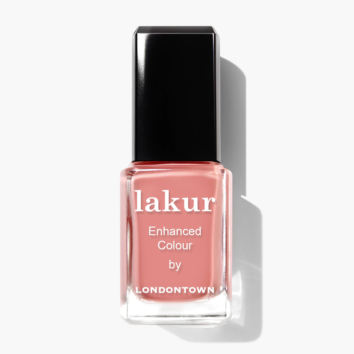 A bottle of Rose-Tinted Glasses (Professional) nail polish by LONDONTOWN, featuring a spring shade of pink, enriched with Himalayan pink sea salt, and completed with a sleek black cap.